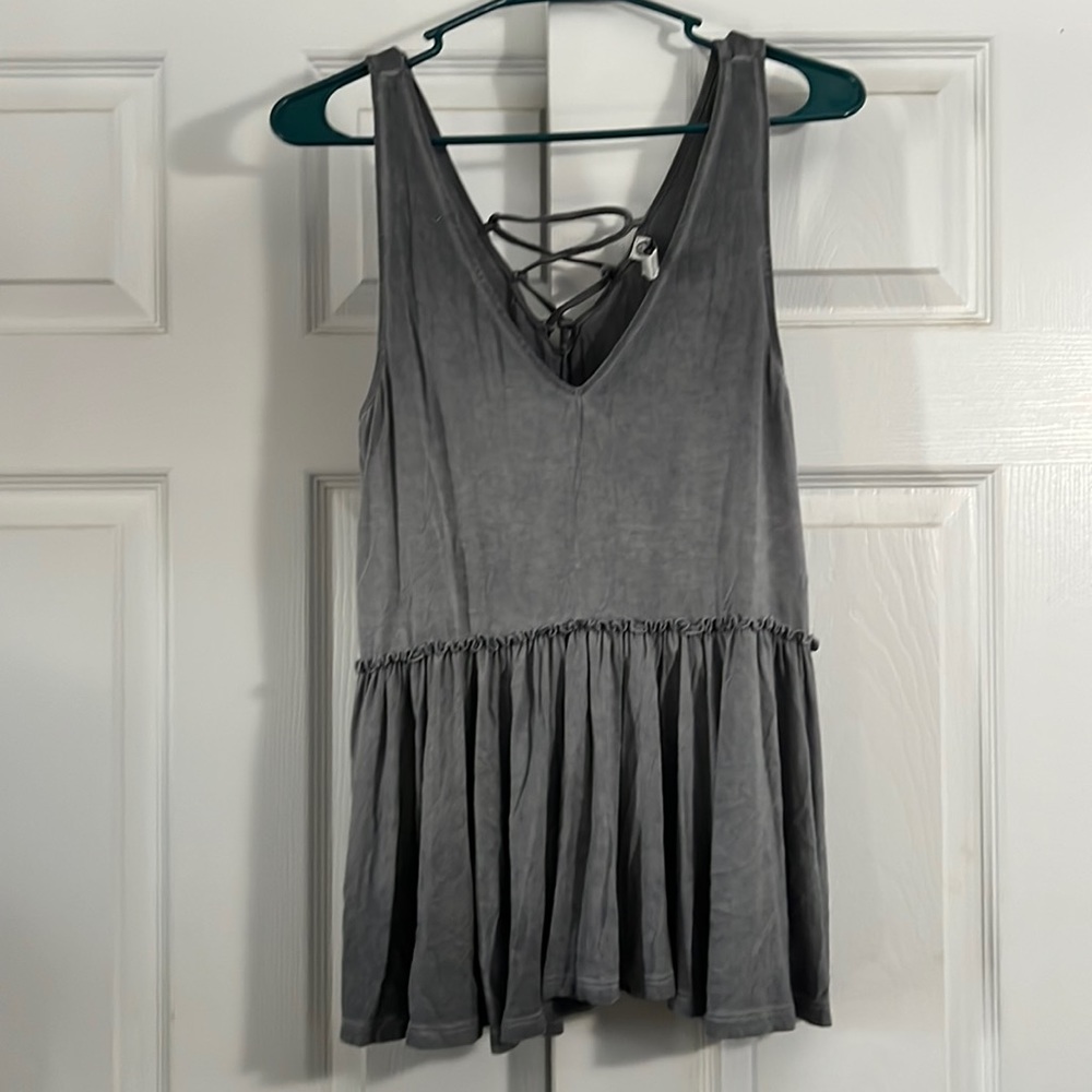 American rag, gray tank top.